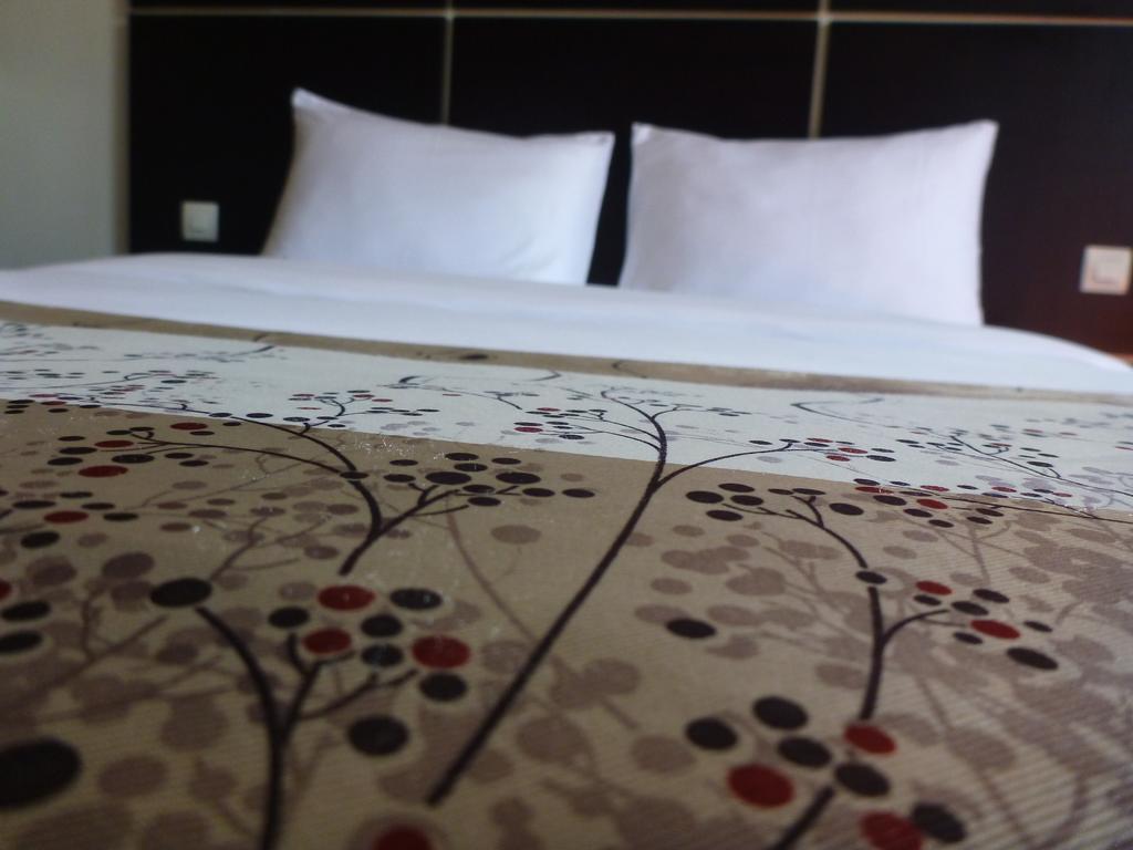 Detente Hotel Abidjan Cameră foto